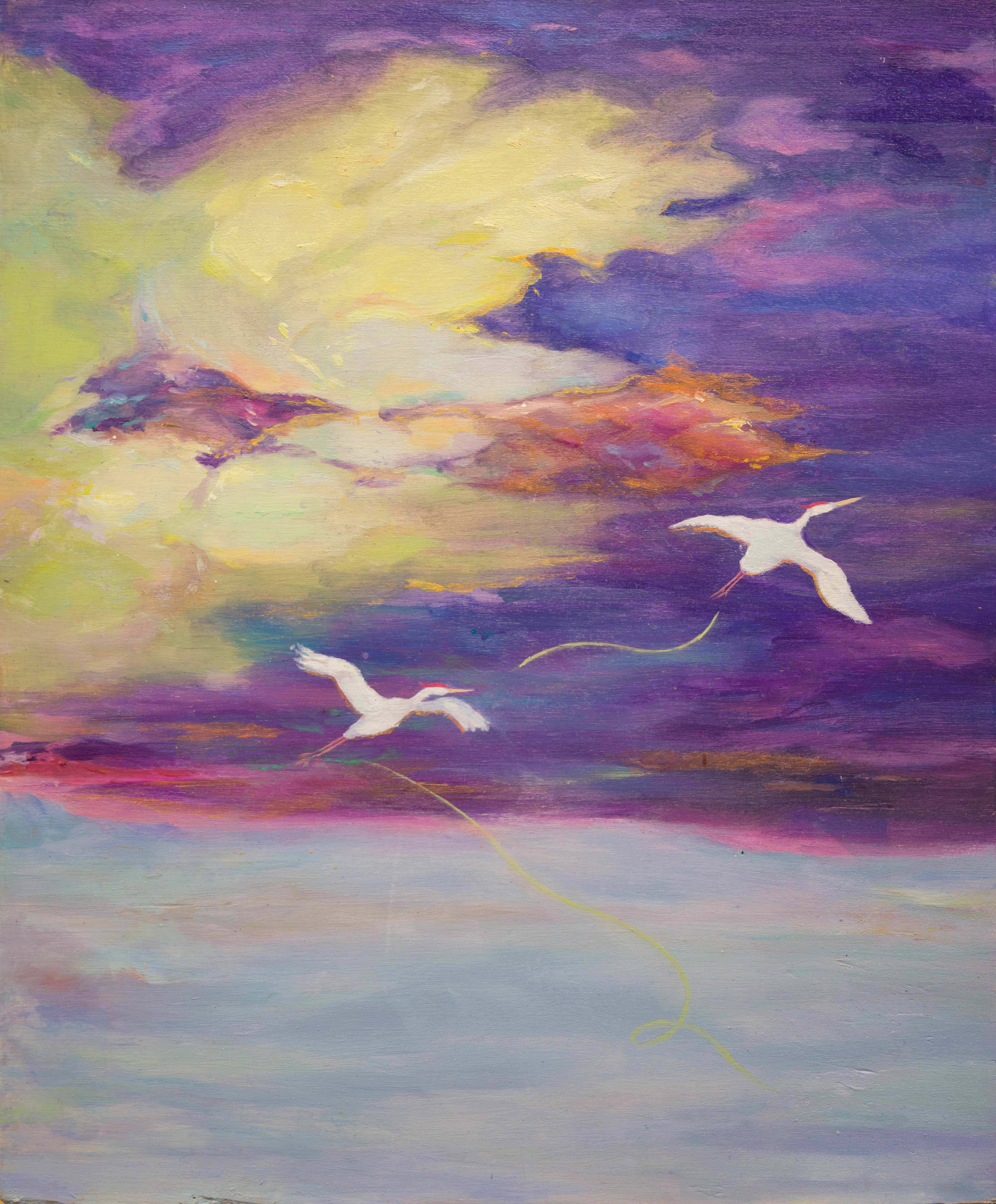 two birds flying across a purple sky over water