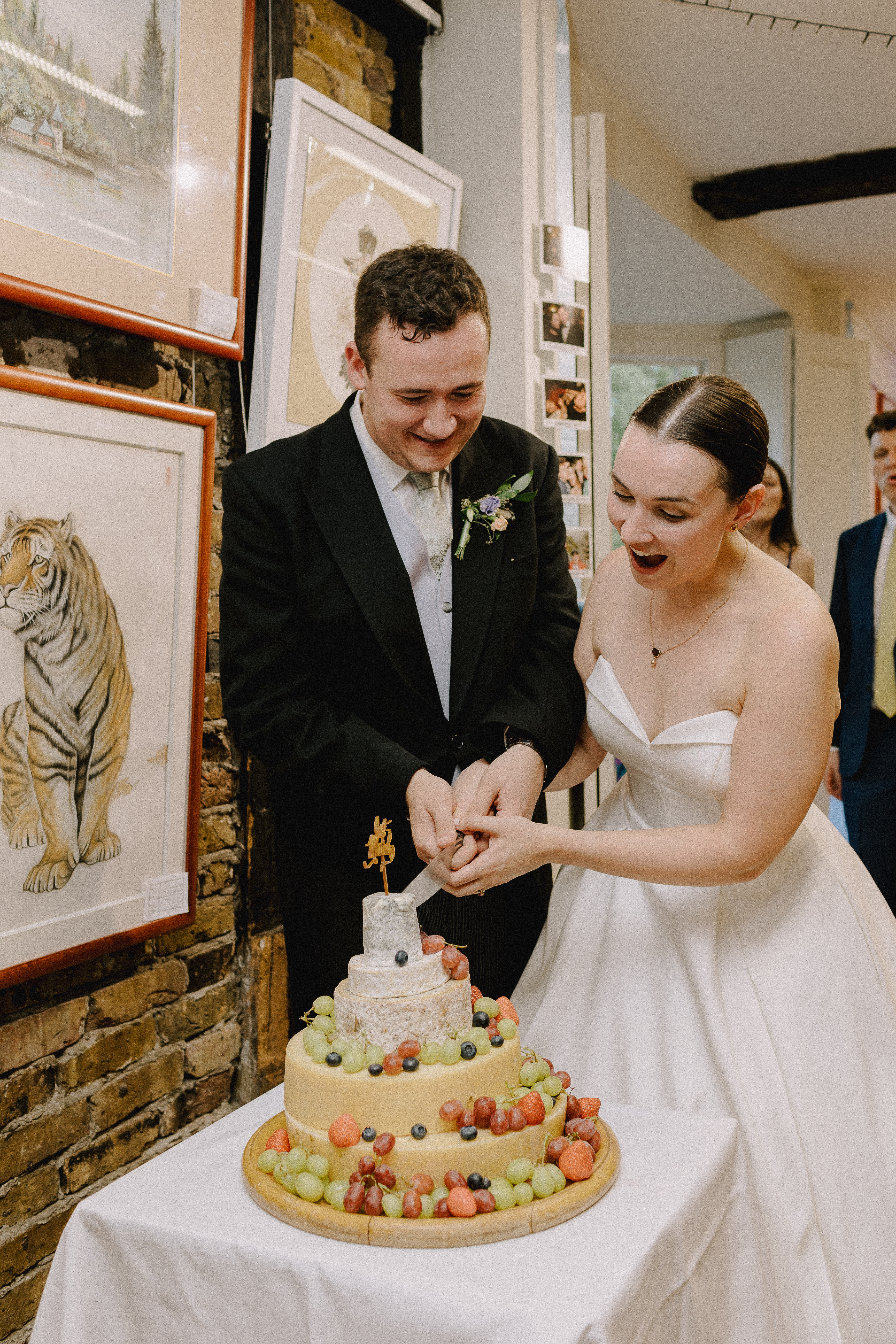 F & C Cutting the (cheese) cake in the Lower Gallery 