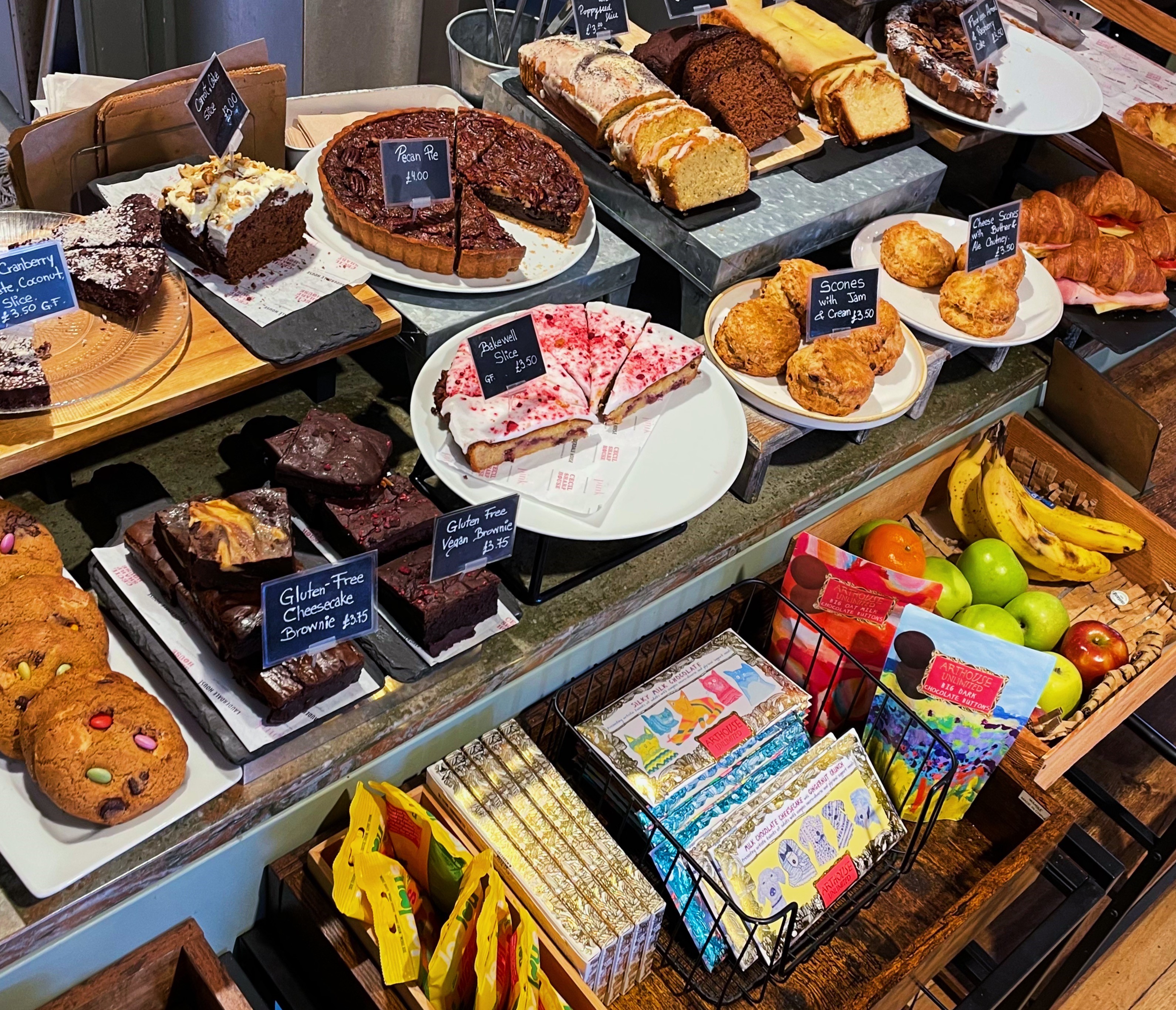 selection of cakes, fruit and chocolate in the cafe